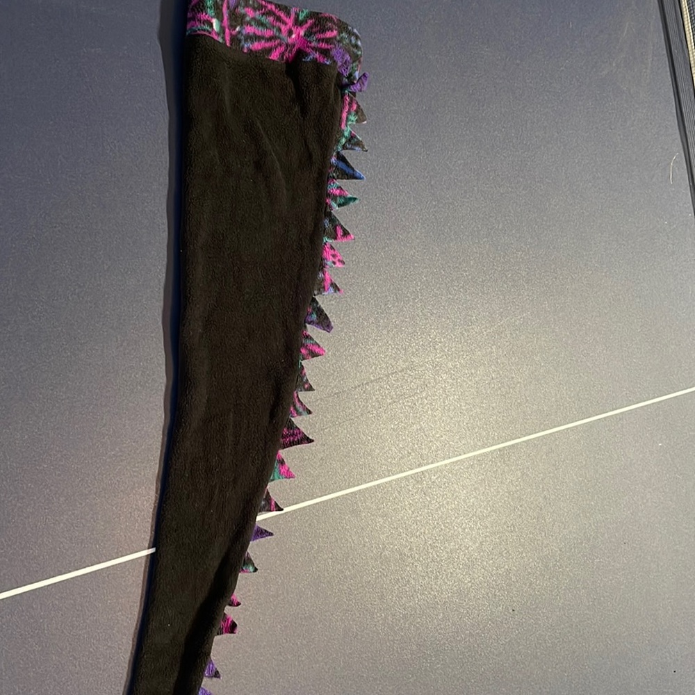 Winter fleece hat with fun dinosaur or lizard or ?? design. About 3 feet long.